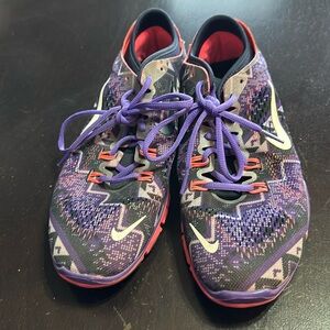 Nike women’s athletic shoes.  Size 9 1/2.  Purple pink black multi.